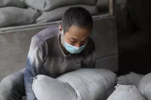 水泥多少斤一袋实际重量(1)