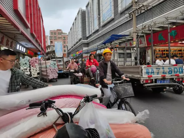 建明小区卖布的搬迁到哪了?(3)