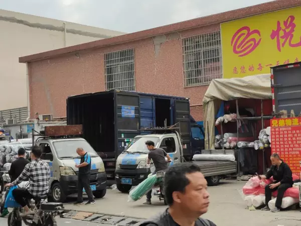 建明小区卖布的搬迁到哪了?(8)