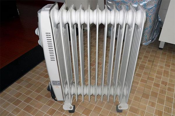 油丁取暖器费电吗.